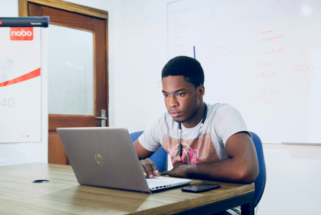 older student learning to code